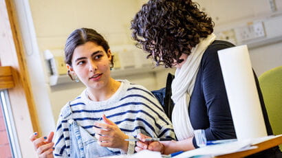 Couple of students sat talking